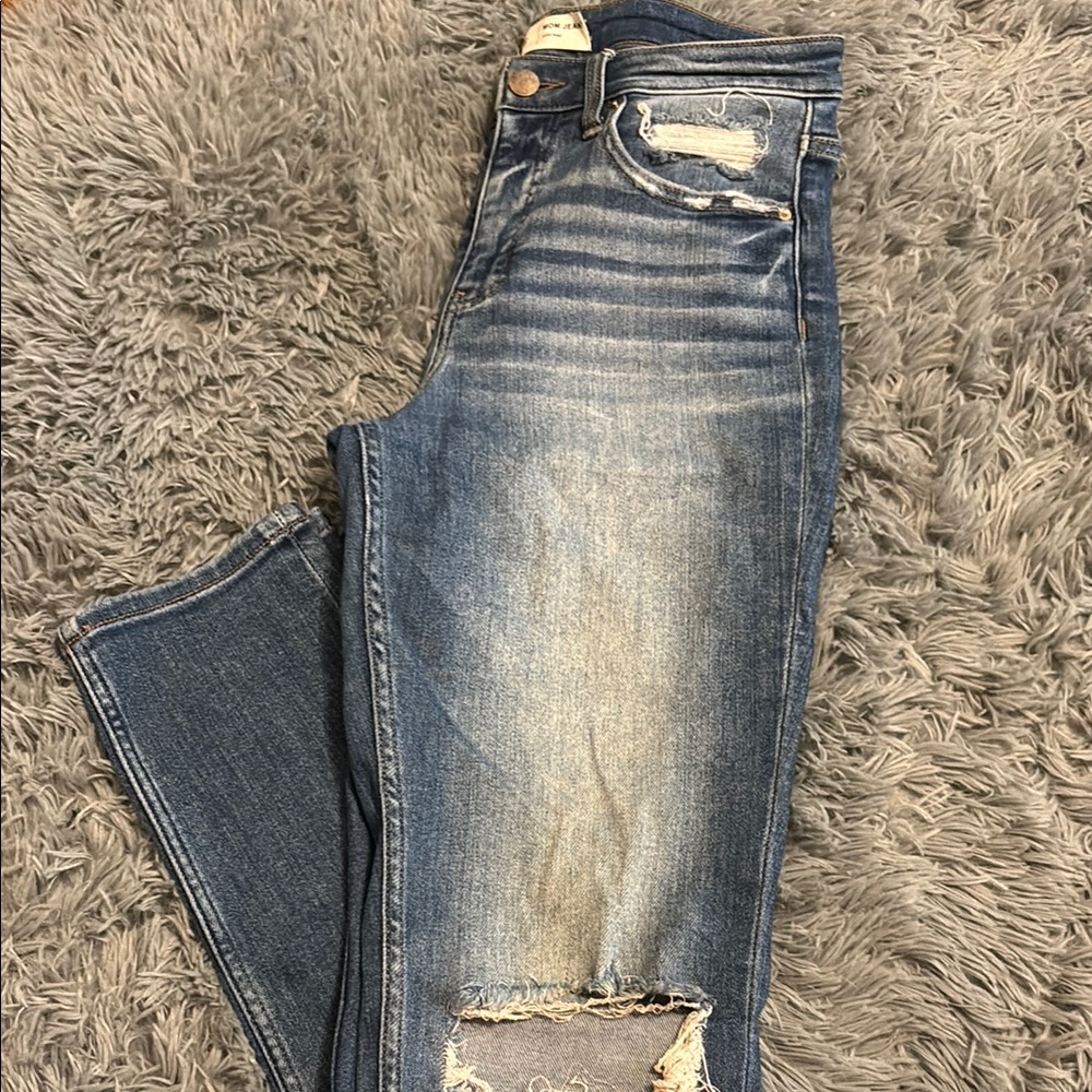 Distressed Blue Jeans
